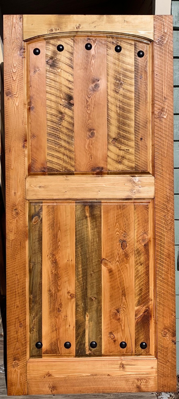 Sante Fe style door with red fir and golden pine