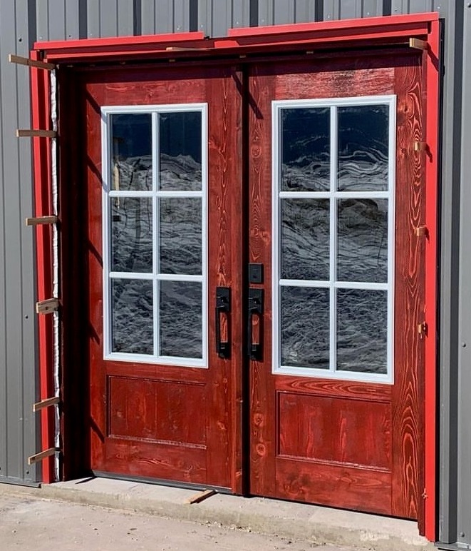 Double outside entry doors with glass, red stain