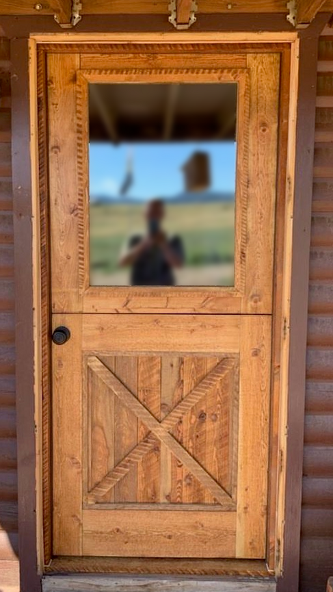 Rustic door with glass top and crossed panel bottom